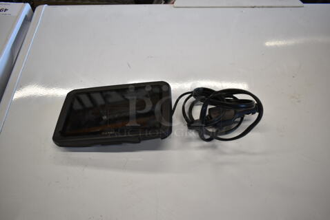 Garmin Dezl GPS w/ Car Charger.