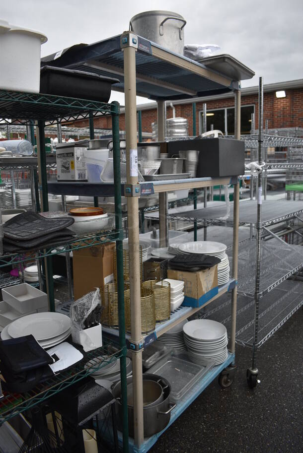 ALL ONE MONEY! Lot of 4 Tiers of Various Smallwares Including White Ceramic Dishes, Metal Stock Pots, Drop In Bins. Does Not Include Shelving Unit