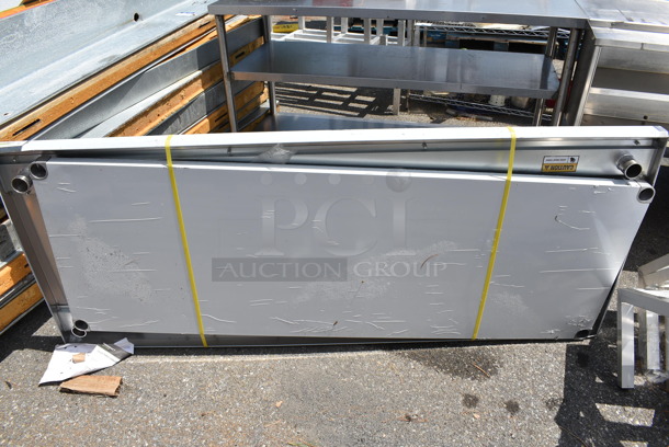 BRAND NEW SCRATCH AND DENT! Regency 600T3072G 30" x 72" 18-Gauge 304 Stainless Steel Commercial Work Table with Galvanized Legs and Undershelf.  - Image 3 of 4