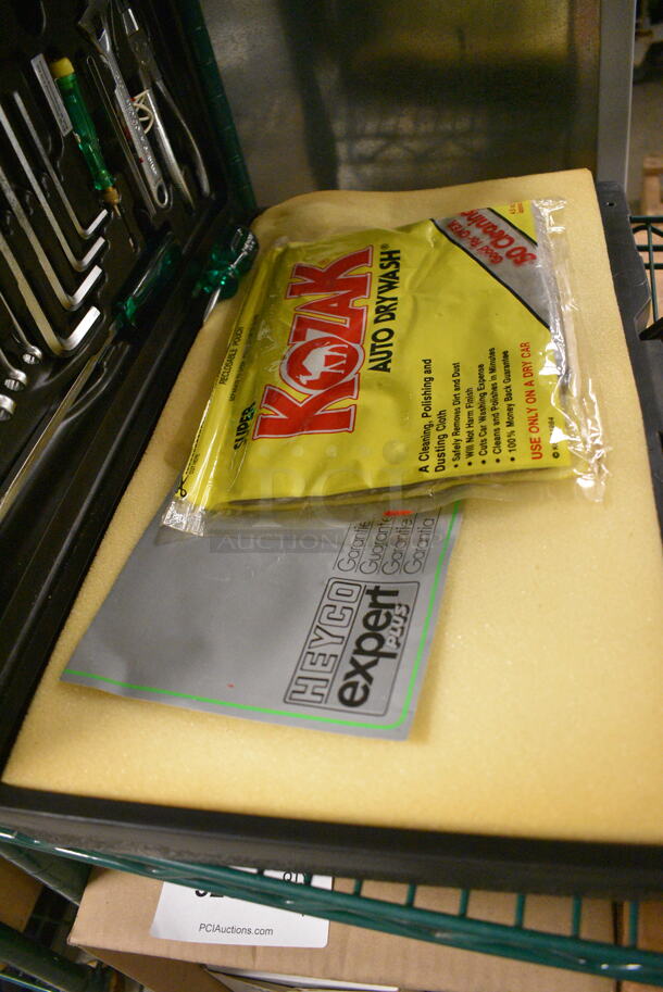 ALL ONE MONEY! Tier Lot of Various Items Including Steel Floor Jack with Case, Tool Kit, Light Bulbs, and Gloves - Image 7 of 7