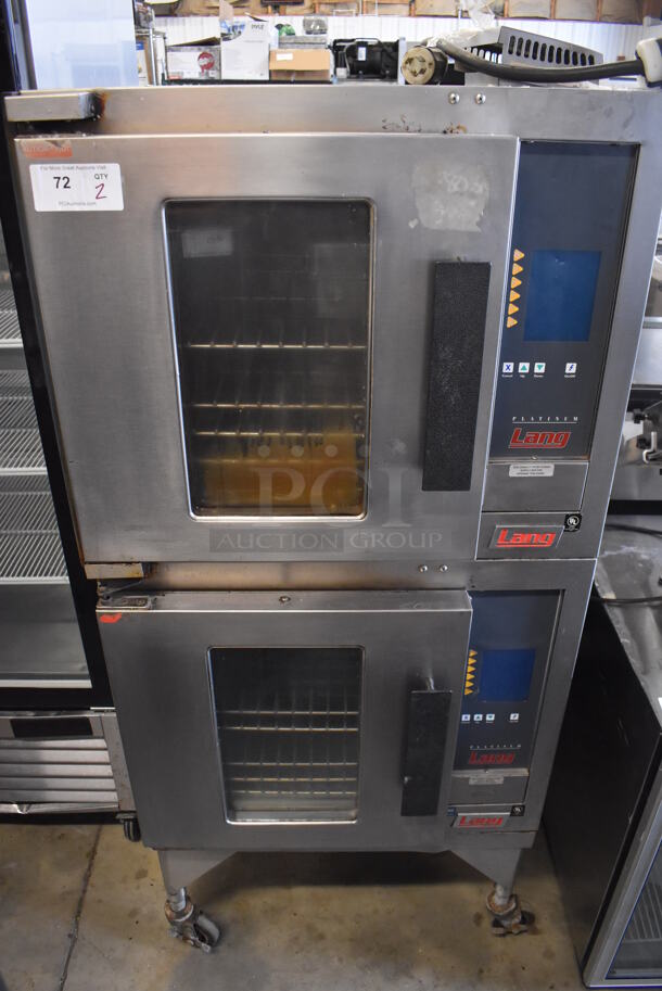 2 Lang Stainless Steel Commercial Electric Powered Half Size Convection Oven w/ View Through Door and Metal Oven Racks on Commercial Casters. 208 Volts, 1/3 Phase. 31x26x66.5. 2 Times Your Bid!