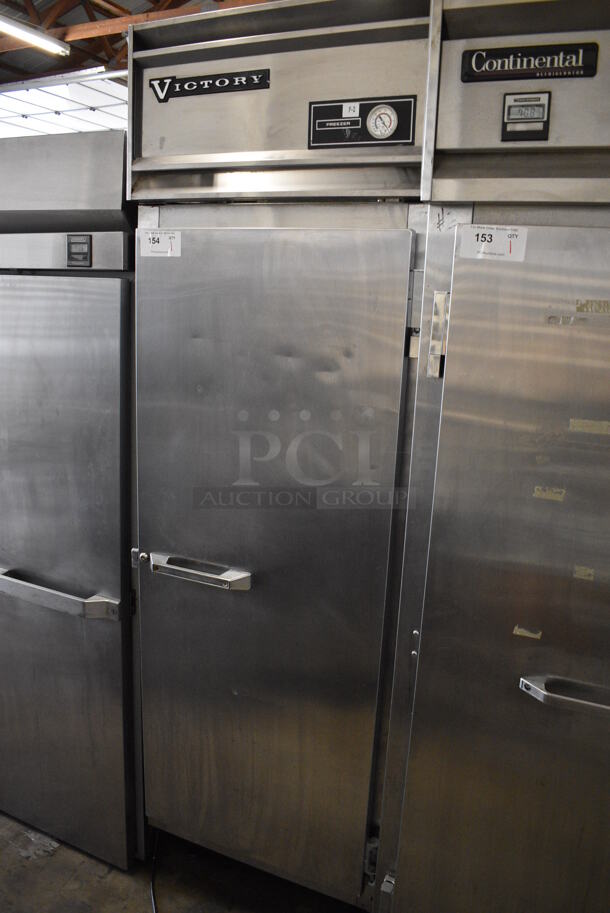 Victory FAA-1D-S7 Stainless Steel Commercial Single Door Reach In Freezer w/ Poly Coated Racks. 115 Volts, 1 Phase. 26.5x33x84. Tested and Powers On But Does Not Get Cold