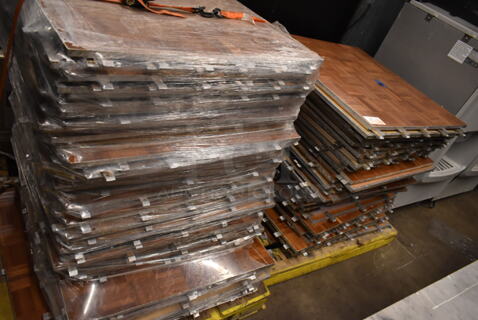 TWO PALLET LOT of Approximately 108 PFM Dance Floor Pieces. Makes About a 30'x30' Dance Floor. 