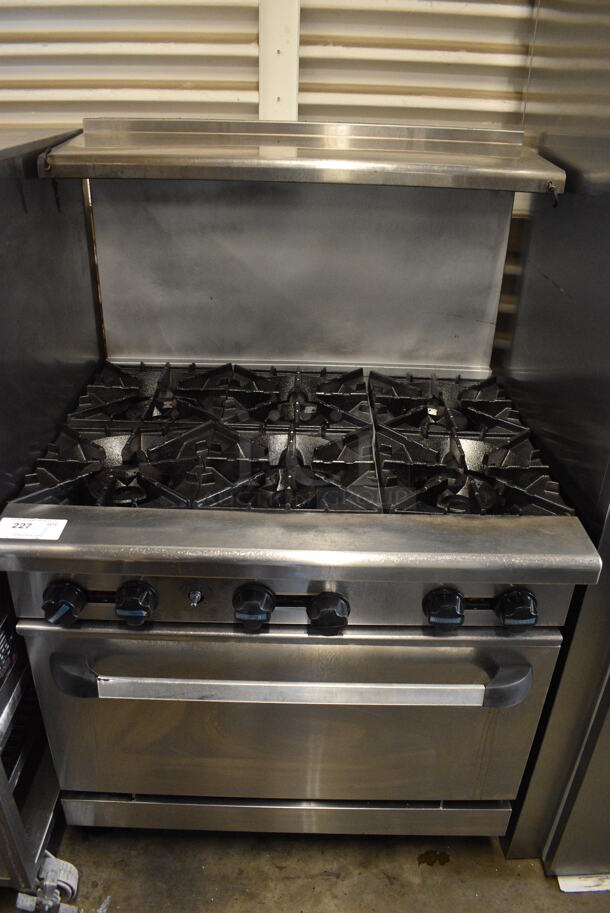 Stainless Steel Commercial Natural Gas Powered 6 Burner Range w/ Oven, Over Shelf and Back Splash. 36x33x56