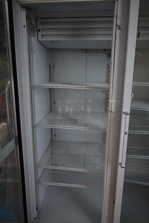 National ULG50BCP-6 Metal Commercial 2 Door Reach In Freezer Merchandiser w/ Poly Coated Racks. 115/208-230 Volts, 1 Phase.  - Image 2 of 4