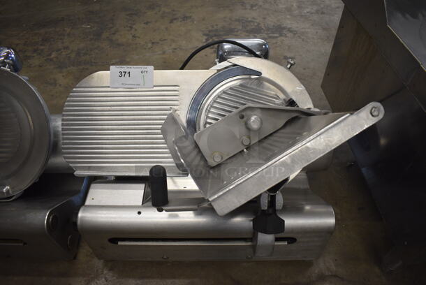 Globe Stainless Steel Commercial Countertop Automatic Meat Slicer w/ Blade Sharpener. 115 Volts, 1 Phase. 26x22x20. Tested and Powers On But Parts Do Not Move
