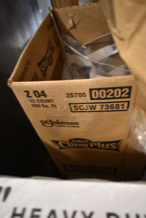 PALLET LOT of 25 BRAND NEW Boxes Including 12224X1HD Choice 24" x 1000' Food Service Heavy-Duty Aluminum Foil Roll, 129MCS38B Choice 38 oz. Black Rectangular Microwavable Heavy Weight Container with Lid 8 3/4" x 6 1/4" x 2" - 150/Case, 3 Box 130HBKCUTFW Visions Individually Wrapped Black Heavy Weight Plastic Fork - 1000/Case, 127P2C Choice Clear Plastic Souffle Cup / Portion Cup - 2 oz. - 2500/Case, 4070029 Choice Full Size 2 1/2" Deep 24 Gauge Anti-Jam Stainless Steel Steam Table / Hotel Pan, 500MFTN Lavex Natural Brown Kraft M-Fold (Multifold) Towel - 4000/Case, 394365L Noble Products Powder-Free Disposable Clear Vinyl Gloves for Foodservice - Large - 1000/Case. 25 Times Your Bid! - Image 9 of 10