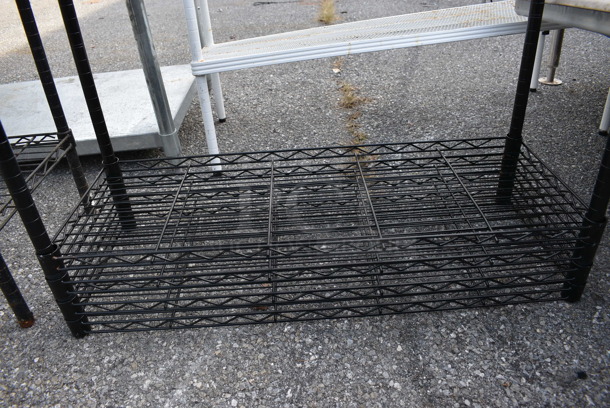 Black Finish 4 Tier Wire Shelving Unit. BUYER MUST DISMANTLE. PCI CANNOT DISMANTLE FOR SHIPPING. PLEASE CONSIDER FREIGHT CHARGES. 35.5x14x54 - Image 2 of 3