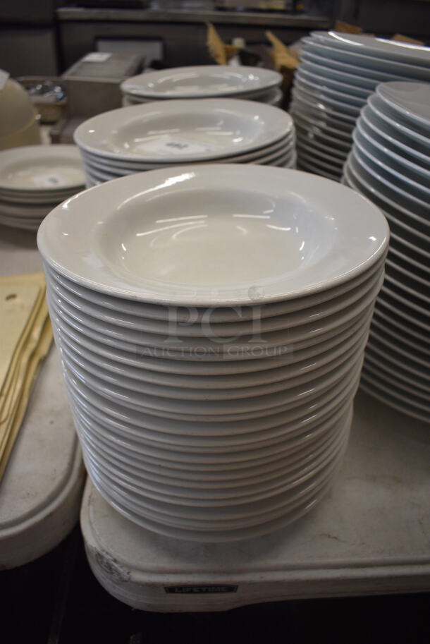 24 White Ceramic Pasta Plates. 9x9x2. 24 Times Your Bid!