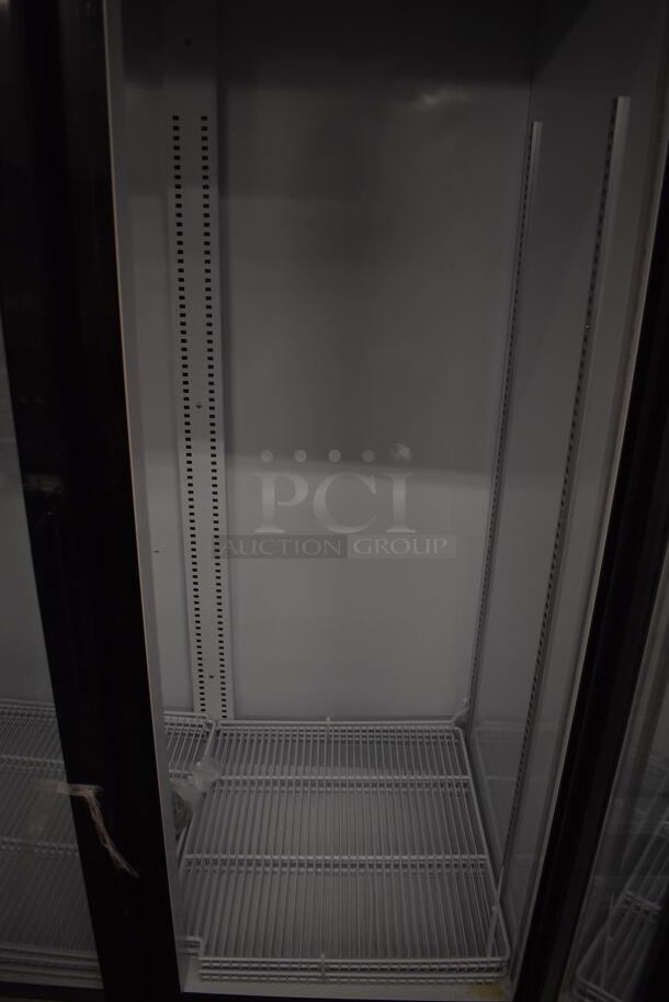 BRAND NEW SCRATCH AND DENT! KoolMore MDR-2GD-35C Metal Commercial 2 Door Reach In Cooler Merchandiser w/ Poly Coated Racks on Commercial Casters. 115 Volts, 1 Phase. 45x29x80. Tested and Working! - Image 5 of 5