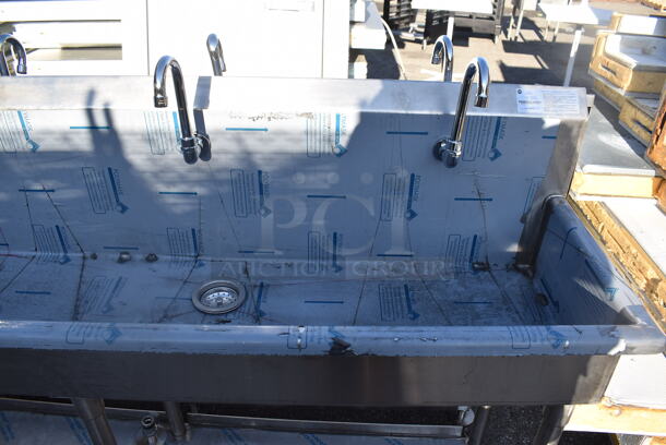 BRAND NEW SCRATCH AND DENT! Advance Tabco FS-FMM-100FV Stainless Steel 16 Gauge Multi Station Hand Sink w/ 5 Faucets, 5 Foot Pedals and Under Shelf. 100x18.5x44 - Image 4 of 7
