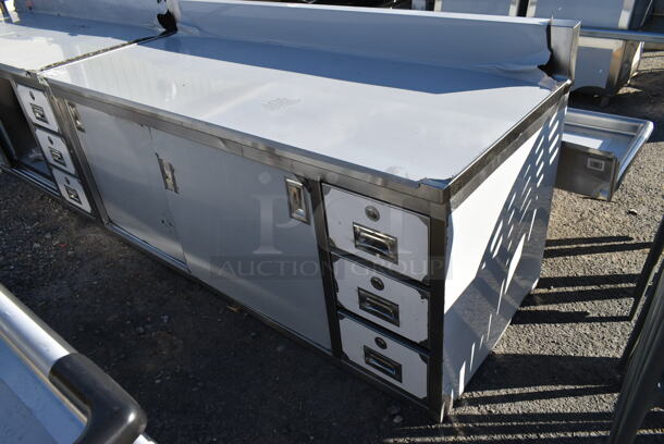 BRAND NEW SCRATCH AND DENT! Regency 600EBTB3072R 30" x 72" 16 Gauge Type 304 Stainless Steel Enclosed Base Sliding Door Table with Drawers and 6" Backsplash - Image 2 of 9