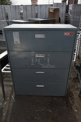 Gray Metal 4 Drawer Filing Cabinet. 