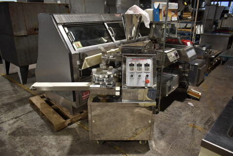 Stainless Steel Commercial Floor Style Steamed Stuffed Bun Machine on Commercial Casters. Tested and Powers On