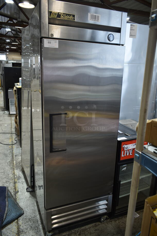 2015 True T-19F Stainless Steel Commercial Single Door Reach In Freezer w/ Poly Coated Racks on Commercial Casters. 115 Volts, 1 Phase. Tested and Working!