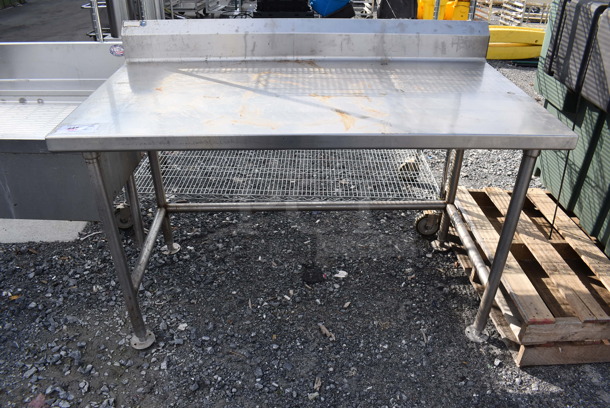 Stainless Steel Table w/ Back Splash. 55x30x40