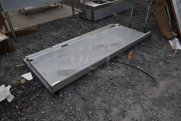 BRAND NEW SCRATCH AND DENT! Regency 600TSB3072S Stainless Steel Commercial Tabletop w/ Back Splash and Under Shelf. - Image 3 of 4