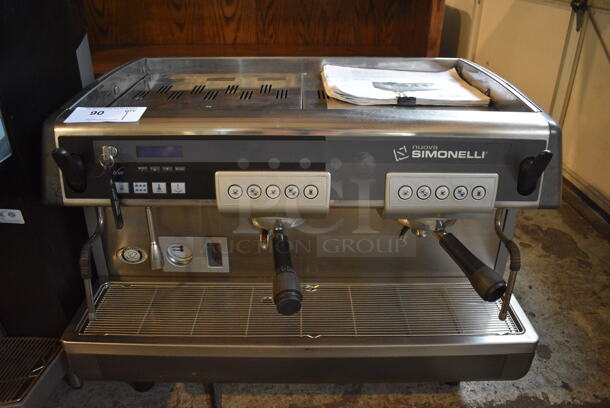 Nuova Simonelli Aurelia Stainless Steel Commercial Countertop 2 Group Espresso Machine w/ 2 Portafilters and 2 Steam Wands. 208-240 Volts, 1 Phase. 29x19x24