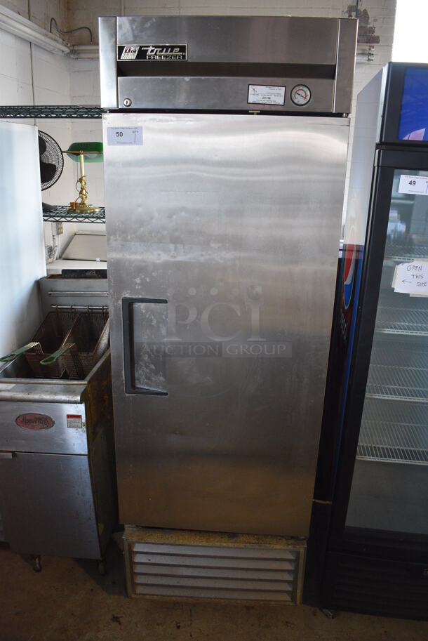 True Model T-23F Stainless Steel Commercial Single Door Reach In Freezer w/ Poly Coated Racks on Commercial Casters. 115 Volts, 1 Phase. 27x30x83. Tested and Powers On But Temps at 31 Degrees