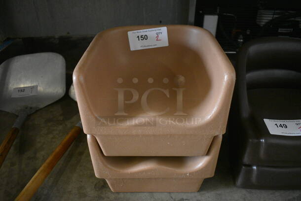 2 Tan Poly Booster Seats. 11x11x8 2 Times Your Bid!