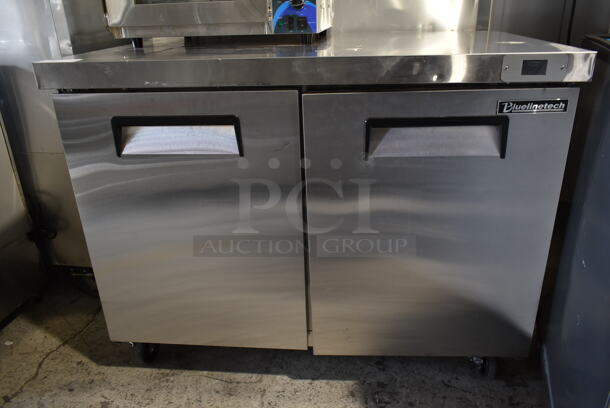 BRAND NEW SCRATCH AND DENT! Bluelinetech BUC48FA Stainless Steel Commercial 2 Door Undercounter Freezer on Commercial Casters. 115 Volts, 1 Phase. Tested and Working! - Image 4 of 7