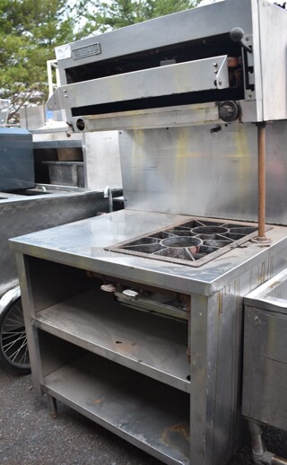 American Range Stainless Steel Commercial Gas Powered 2 Burner Rage in Counter w/ Cheese Melter and 2 Under Shelves.