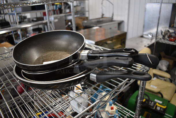 4 Various Metal Skillets. Includes 16x9.5x3. 4 Times Your Bid!