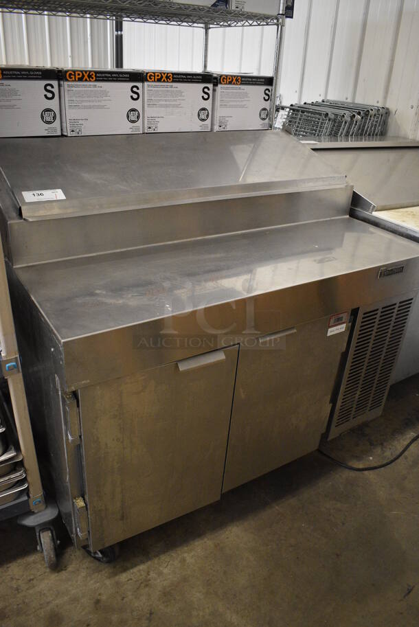 Traulsen Model VPS48S Stainless Steel Commercial Pizza Prep Table on Commercial Casters. 115 Volts, 1 Phase. 48x33x46. Tested and Working!