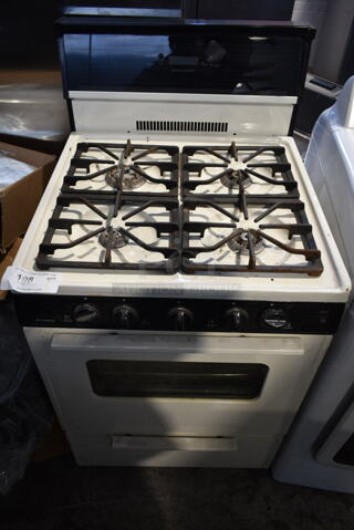 Metal Natural Gas Powered 4 Burner Range w/ Oven.