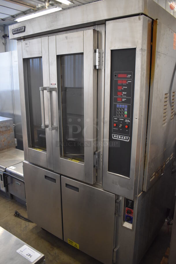 Hobart HO300E Stainless Steel Commercial Floor Style Electric Powered Mini Rotating Rack Oven on 2 Door Proofer w/ Commercial Casters. 208 Volts, 3 Phase. 48x37x81