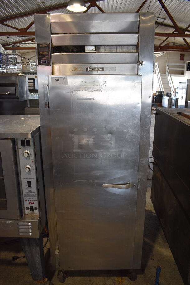 Traulsen Model AHT 1-32 WUT Stainless Steel Commercial Single Door Reach In Cooler on Commercial Casters. 115 Volts, 1 Phase. 30x36x83.5. Tested and Powers On But Does Not Get Cold