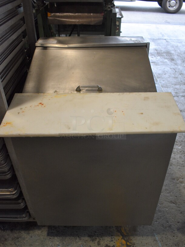 Stainless Steel Commercial Sandwich Salad Prep Table Bain Marie Mega Top w/ Cutting Board and Various Drop In Bins. 27x29.5x43. Tested and Powers On But Does Not Get Cold