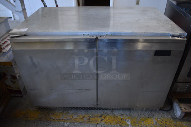 Continental Model UC48 Stainless Steel Commercial 2 Door Undercounter Cooler on Commercial Casters. 115 Volts, 1 Phase. 48x30.5x32.5. Tested and Working!