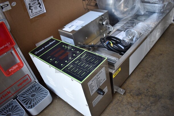 BRAND NEW IN BOX! Model T-101 Stainless Steel Commercial Countertop Electric Powered Automatic Donut Making Machine. 110 Volts. Stock Picture Used As Gallery. 39x19x24. - Image 6 of 11