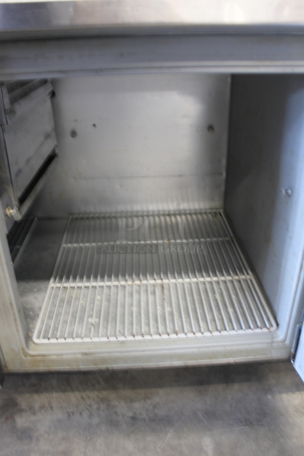 Randell Pizza Prep Table 8264NM w/ Poly Coated Racks on Commercial Casters. 115 Volt, 1 Phase. Tested and Powers On But Does Not Get Cold
 - Image 6 of 8