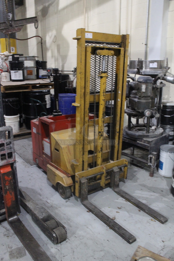 Metal Commercial Electric Powered Narrow Aisle Single Reach Forklift. BUYER MUST REMOVE - Image 1 of 6
