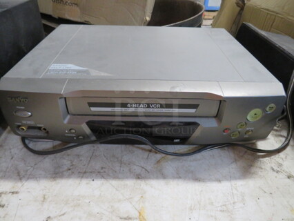 One Sanyo VCR Player.