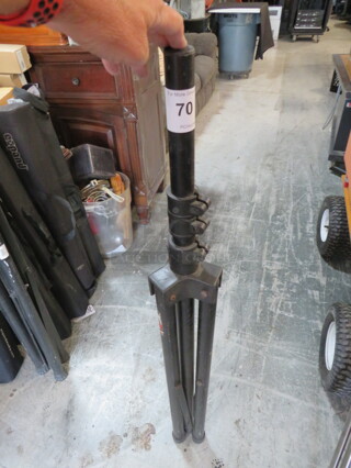One Tripod Stand.