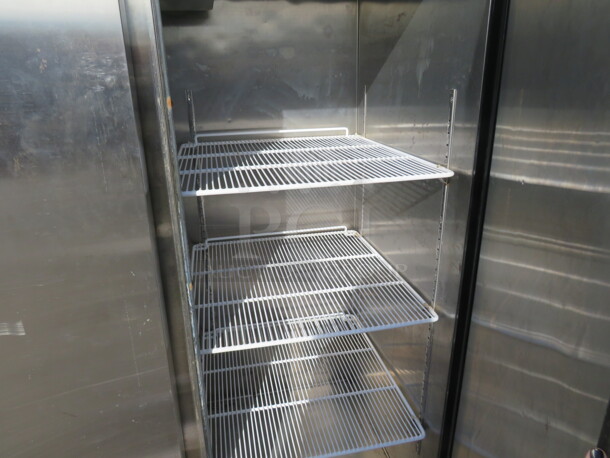 One Atosa 3 Door Stainless STeel Freezer With 9 Racks On Casters. 115/208-230 Volt. 1 Phase. Model# MBF8003. 78X32X82. Door Needs To Be Reattached.  - Image 3 of 3