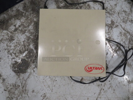 One Ultrak Power Supply Box.  120 Volt.