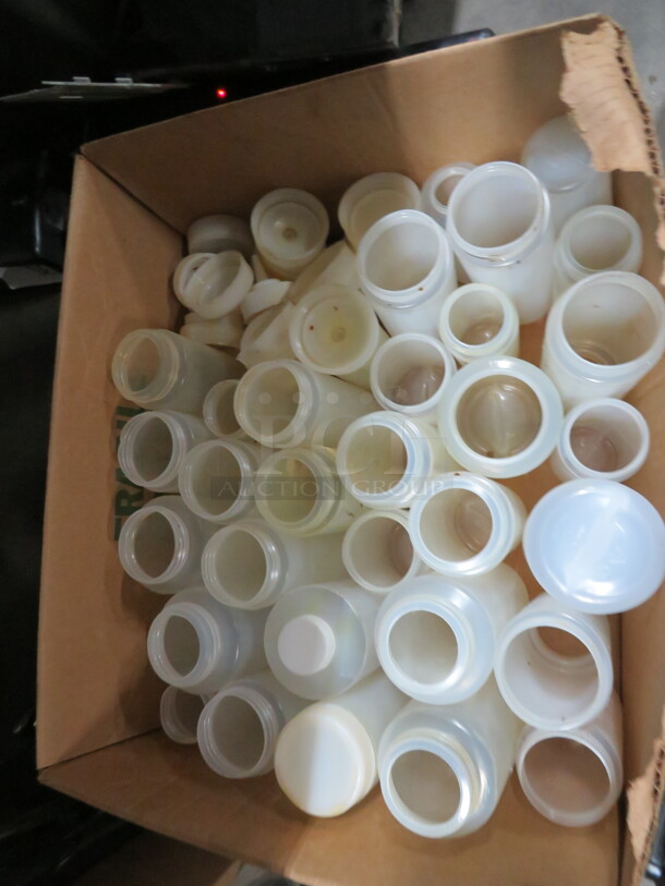 One Mega Lot Of Squeeze Bottles And Lids.