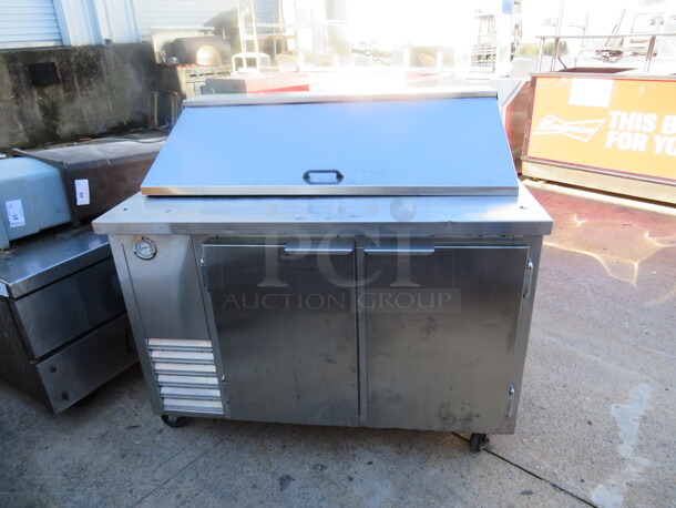 One Refrigerated 2 Door Prep Table With 2 Racks On Casters. 48X32X44