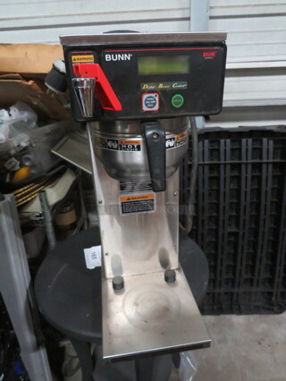 One Bunn Coffee Brewer With Filter Basket. Model# AXIOM-DV-APS. 120 Volt. 9X18.5X23