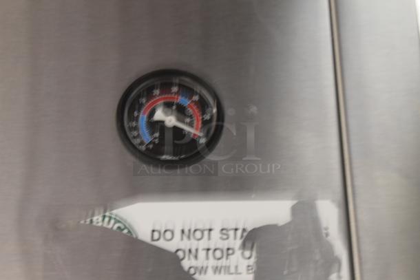 2014 True TG2R-2S ENERGY STAR Stainless Steel Commercial 2 Door Reach In Cooler w/ Poly Coated Racks on Commercial Casters. 115 Volts, 1 Phase. Tested and Working! - Image 3 of 6