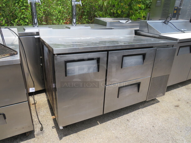 One True 1 Door 2 Drawer Worktop Refrigerator With 2 Racks, And Backsplash On Casters. 115 Volt. Model# TWT-60-32D-2. 60X33X40. $4991.00 - Image 2 of 3