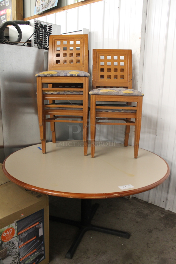 6 Items Including 5 Wooden Lattice Back Chairs With Patterned Cushioned Seat And 1 Round Table On X Prong Base. Cosmetic Condition May Vary. 6 Times Your Bid! 
Table: 59.5X59.5X30, Chairs: 18X16X36