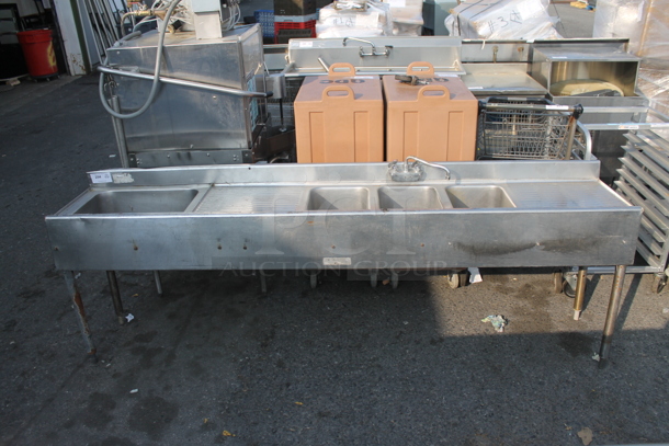Commercial Stainless Steel 4 Bay Sink With Left And Right Drain Boards And Faucet On Galvanized Legs.