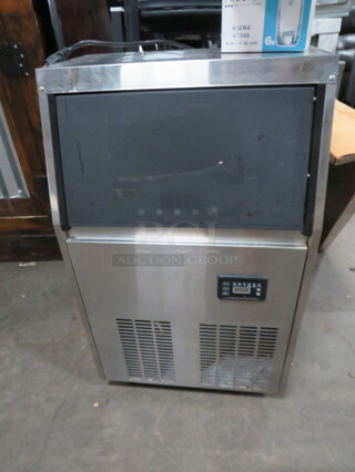 One Stainless Steel Vevor Under Counter Ice Maker. Model# ZBJSY45KGP70-4501V1. 110 Volt. 20X15X33.