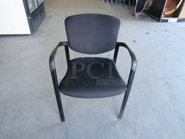Black Metal Stack Arm Chair With Cushioned Seat And Back. 3XBID
