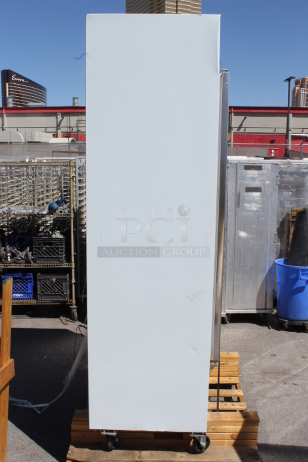 BRAND NEW SCRATCH & DENT! Avantco GDC-40-HC 48" White Swing Glass Door Merchandiser Refrigerator with LED Lighting. Unit is badly dented on the back and front air grate covers.  Not tested. Wires are cut. S/N: 871987927 - Image 4 of 11
